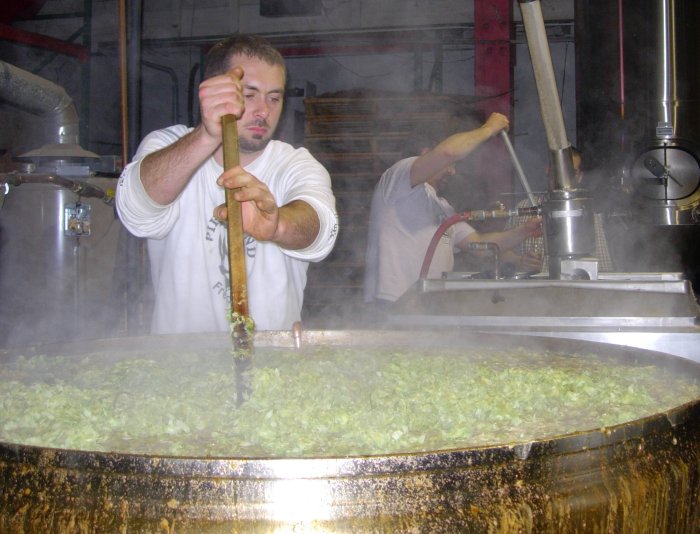 Stirring the brew kettle.