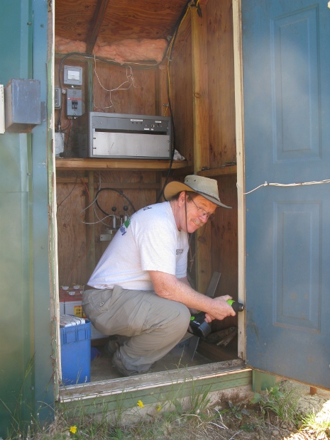 Gil installing hinges.