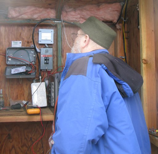 tim examining charge controller